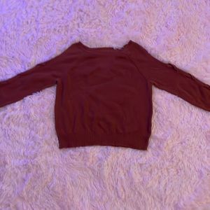 Light brown/red sweater. Size small.